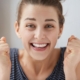 Smiling girl with straight aligned teeth