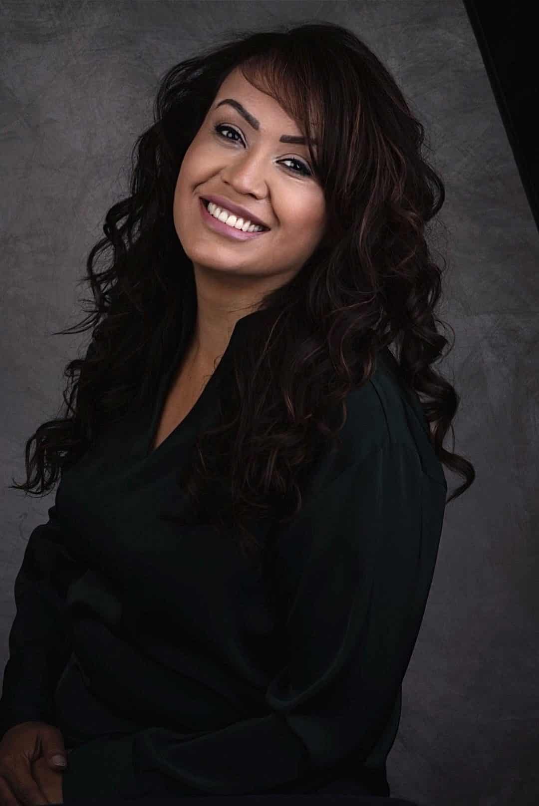 Patient smiling confidently after dental treatment